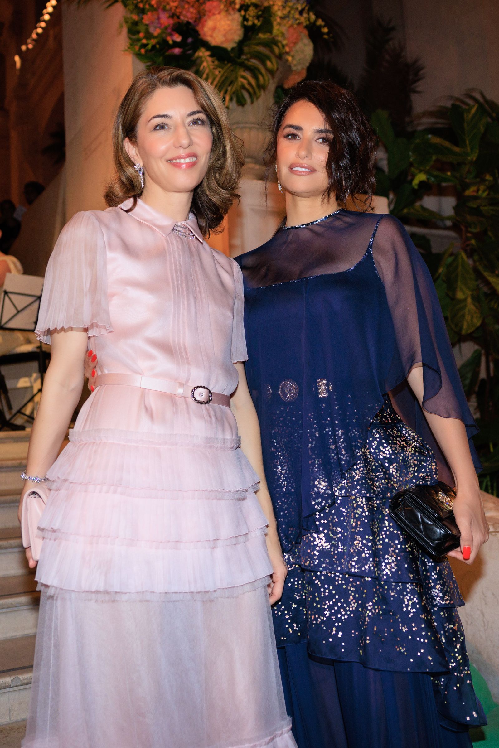 Image may contain Sofia Coppola Penlope Cruz Clothing Dress Blouse Evening Dress Formal Wear Adult and Person